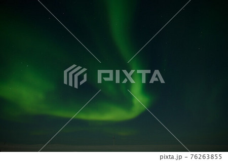 northern light on the silent field before sun rise. northern light on the silent field before sun rise. 76263855