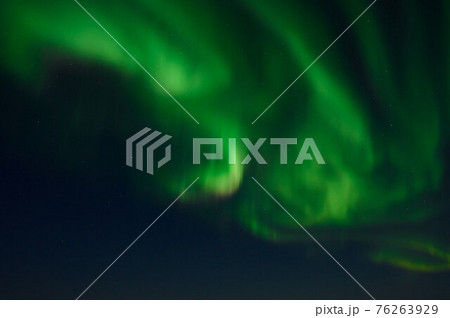 northern light on the silent field before sun rise. 76263929