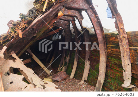 Close up surface of old wooden boat, of old shipyard side. Close up surface of old wooden boat, of old shipyard side. 76264003