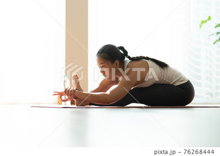 Asian woman pilates exercise yoga in home. 76268444