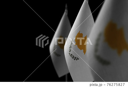 Small national flags of the Cyprus on a black background Small national flags of the Cyprus on a black background 76275827