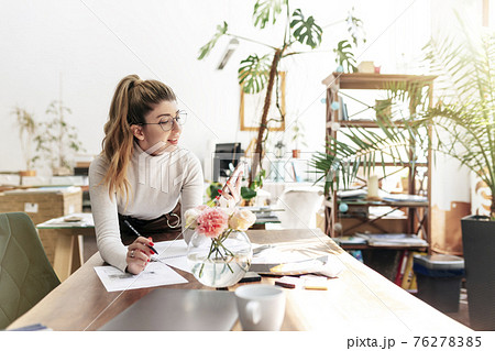 An interior designer is working on a new project An interior designer is working on a new project 76278385