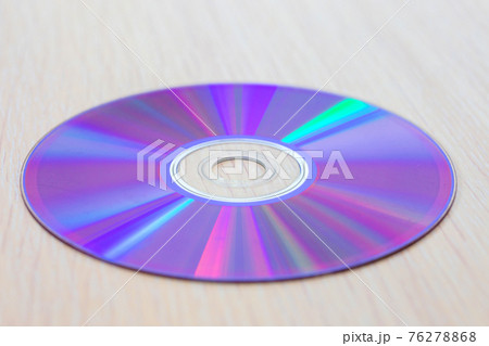 Compact disk close up. Beautiful multi-colored surface. Data carrier Compact disk close up. Beautiful multi-colored surface. Data carrier 76278868