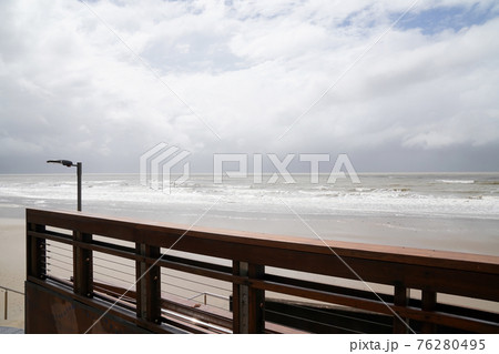 A Wet And Stormy Day On The Beach 76280495
