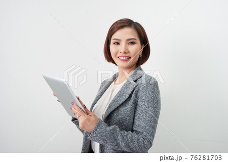 young business woman with digital tablet in office lobby young business woman with digital tablet in office lobby 76281703