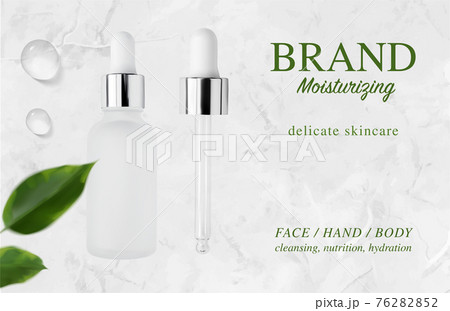 Serum glass bottle, pipette, essence drops and defocused leaves on luxury marble background 76282852
