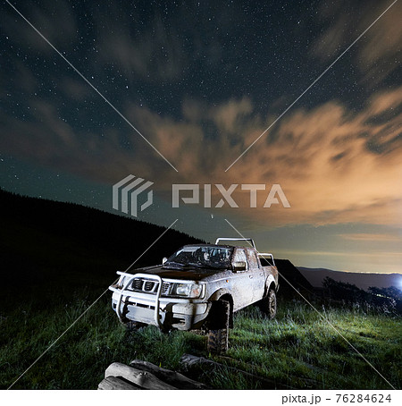 Dirty big car in forest or mountains. Dirty big car in forest or mountains. 76284624