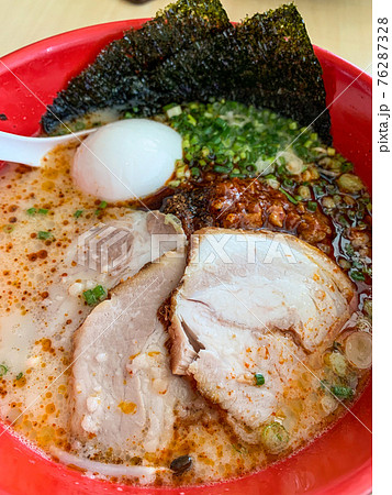 Closeup karaka spicy miso ramen with egg and chashu. 76287328