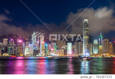 Hong Kong downtown skyline across Victoria harbor at night, Hong Kong, China. 76287355