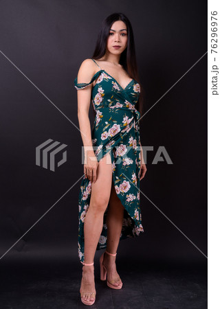 Full body shot of young beautiful Asian transgender woman 76296976
