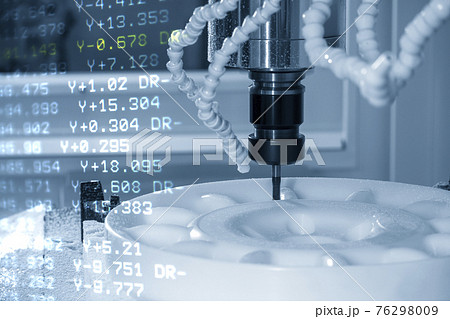Abstract scene of CNC milling machine and G-code data background cutting the POM material.  76298009