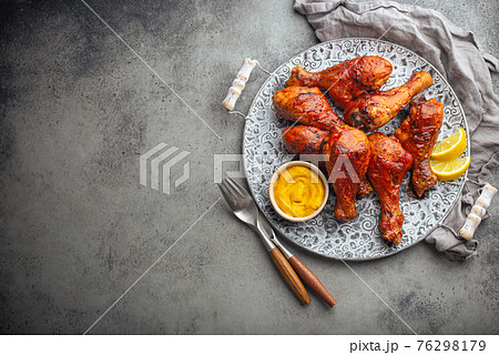 Indian food Tandoori chicken legs from above copy space Indian food Tandoori chicken legs from above copy space 76298179