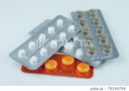 Pills in a blister pack. 76299768