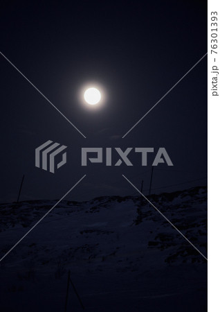 northern light on the silent field before sun rise. 76301393