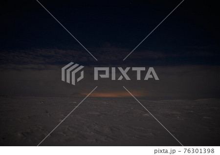 northern light on the silent field before sun rise. northern light on the silent field before sun rise. 76301398