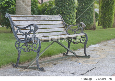 Wooden chair for relaxing in the garden. 76309176