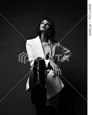 Black and white. Gorgeous naughty rich woman in 76311906