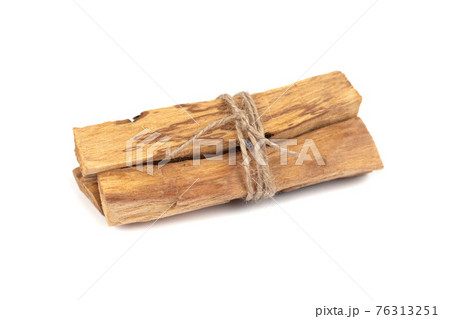 Palo Santo tree sticks isolated on white - holy incense tree from Latin America. Meditation, mental health and personal fulfilment concept. Selective focus 76313251