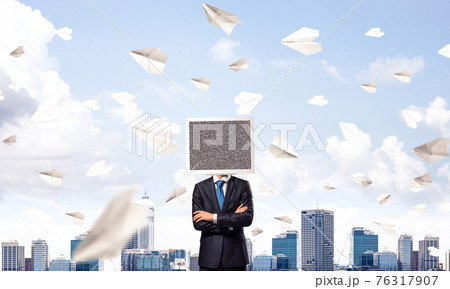Businessman with monitor instead of head. Businessman with monitor instead of head. 76317907