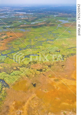 Aerial view, Okavango Delta, Okavango Wetland, Botswana Aerial view, Okavango Delta, Okavango Wetland, Botswana 76320942