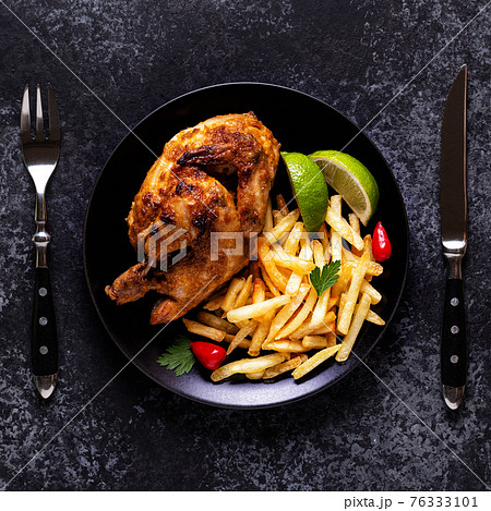 Half roasted chicken Piri Piri with french fries 76333101