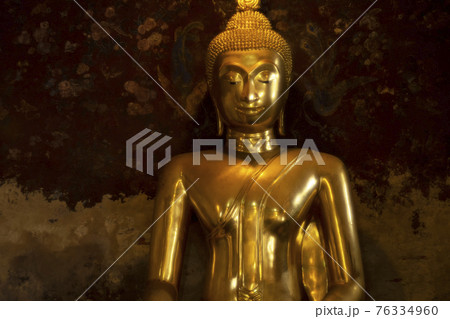 Ancient buddha statue at Wat Suthat temple ,Bangkok ,Thailand 76334960