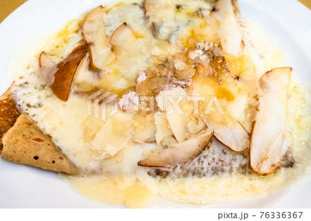 top view crepes with Gorgonzola and pear close up 76336367