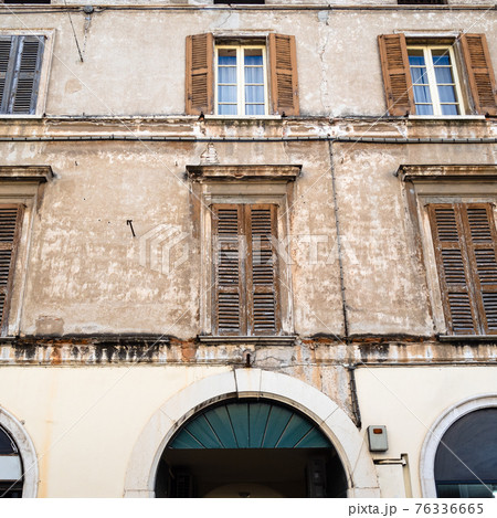 shabby urban medieval house in Brescia city shabby urban medieval house in Brescia city 76336665
