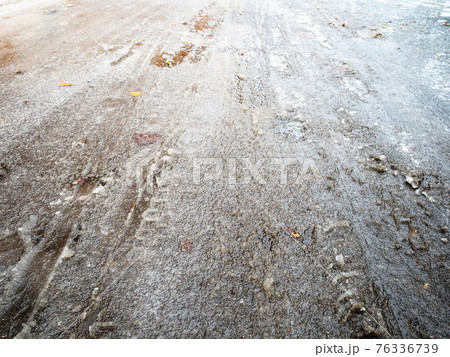 frozen car tire tread imprints on slippery road frozen car tire tread imprints on slippery road 76336739