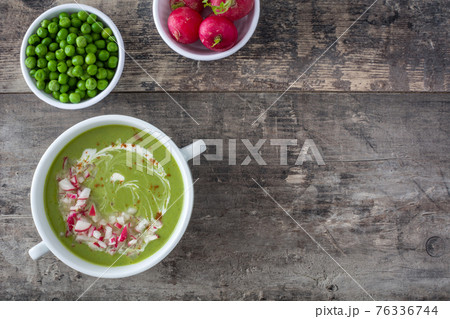 Pea soup on rustic wooden table Pea soup on rustic wooden table 76336744