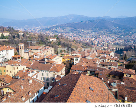 view of north of Bergamo city with Alps mountain view of north of Bergamo city with Alps mountain 76336888