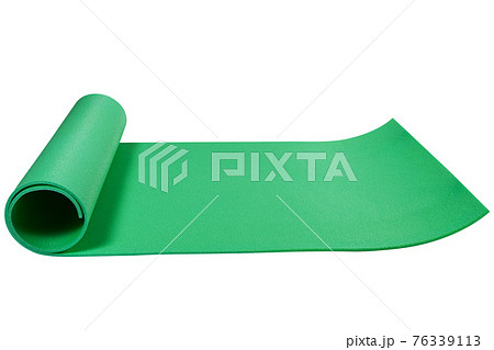 green mat or karemat, for fitness or for a hike, laid out on a white background green mat or karemat, for fitness or for a hike, laid out on a white background 76339113