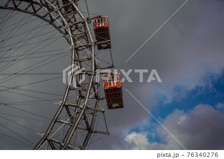 Ferris wheel in an amusement park Ferris wheel in an amusement park 76340276