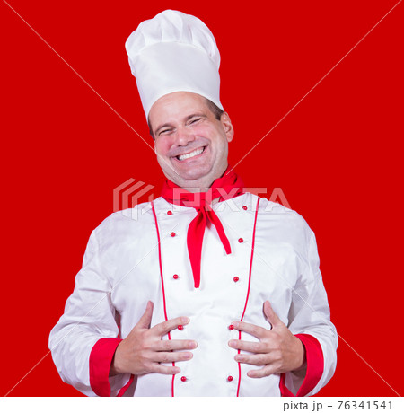 happy cook holding hands on his belly happy cook holding hands on his belly 76341541