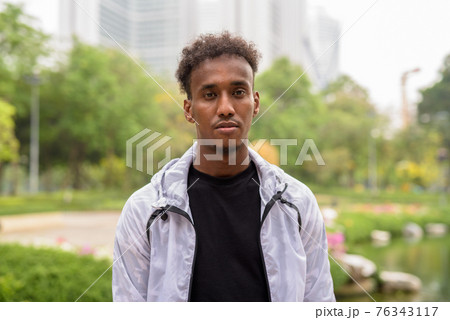 Portrait of handsome black African man with cool attitude 76343117