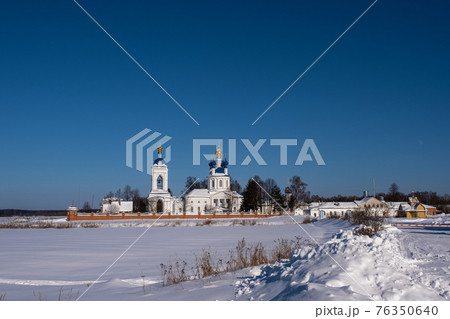 Uspensky Dunilovsky convent in the village of Dunilovo, Ivanovo region, on a sunny winter day. Uspensky Dunilovsky convent in the village of Dunilovo, Ivanovo region, on a sunny winter day. 76350640