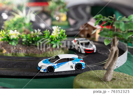 Electric slot cars on toy race track Electric slot cars on toy race track 76352325