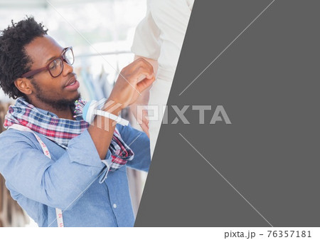 Male fashion designer working on customer dress and grey area with copy space Male fashion designer working on customer dress and grey area with copy space 76357181