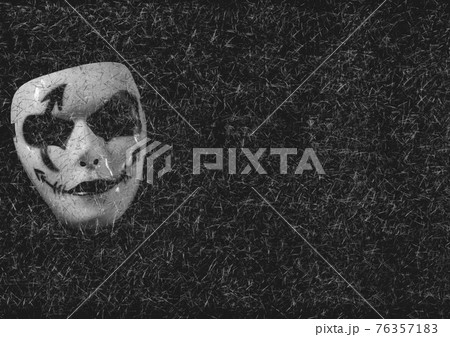 Carnival face mask on grey background with white strokes Carnival face mask on grey background with white strokes 76357183