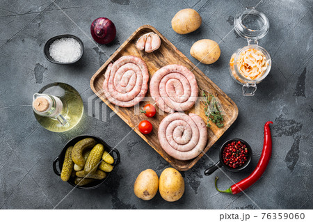 Bavarian sausage mashed potatoes and sour cabbage, on gray background, top view flat lay 76359060