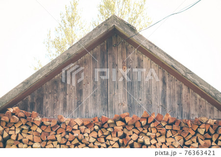 Firewood or fuelwood construction background. Forest timber energy Firewood or fuelwood construction background. Forest timber energy 76363421