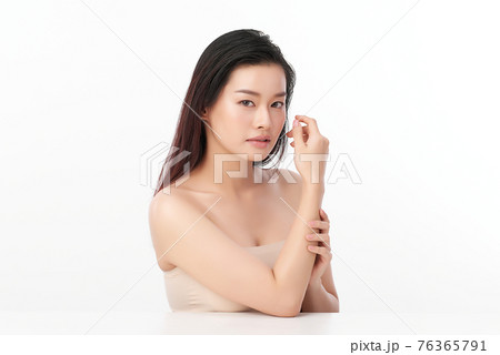 Beautiful young asian woman with clean fresh skin on white background, Face care, Facial treatment, 76365791