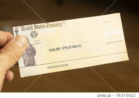 USA dollars background. American rescue plan, USA relief program, stimulus check and Act of 2021 concept. Money, business, profit and livelihood idea USA dollars background. American rescue plan, USA relief program, stimulus check and Act of 2021 concept. Money, business, profit and livelihood idea 76373022