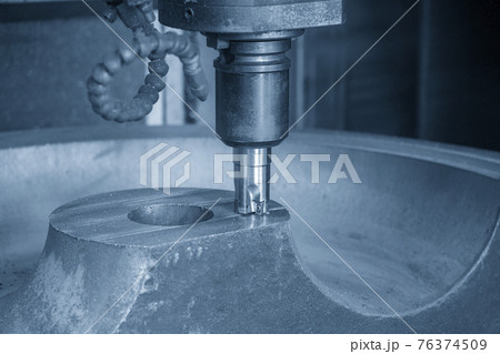The CNC milling machine cutting the cast iron by indexable tool. The CNC milling machine cutting the cast iron by indexable tool. 76374509