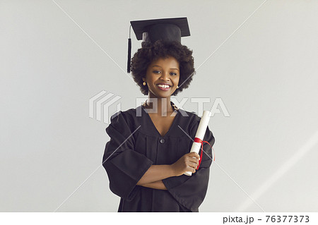 African american high school student with graduate certificate portrait African american high school student with graduate certificate portrait 76377373