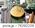 gold coin bitcoin on a computer board, mining concept, cryptocurrency 76382256
