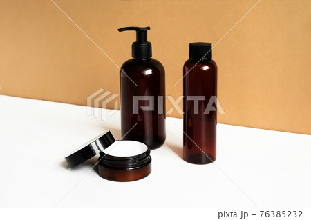 Natural beauty products. Mineral organic oil. Eco cosmetic cream, serum, skin care blank bottle.  76385232