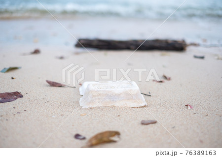 Foam box garbage on the beach. Ecology, Environmental, pollution and Ecological problem concept Foam box garbage on the beach. Ecology, Environmental, pollution and Ecological problem concept 76389163