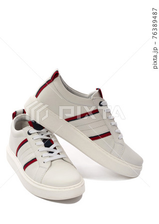 New white sports sneakers on a white background 76389487