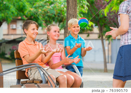 Cheerful children are playing with ball 76390570